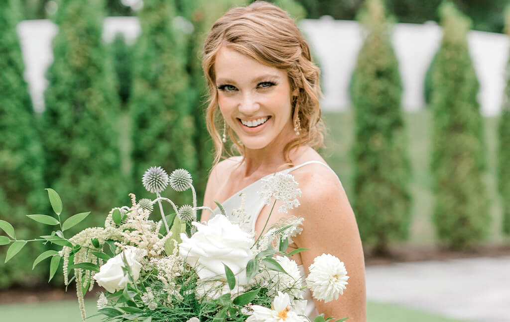 Girl smiling on wedding day with straight teeth